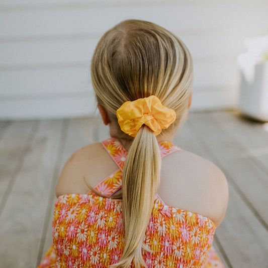 8 year old yellow scrunchie