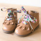 Toddler boot tan for girls with purple shoelaces 